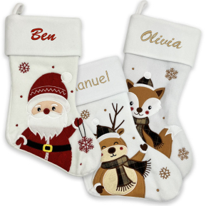 Vit julstrumpa broderad med ett namn Vit julstrumpa broderad med ett namn