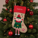 Julstrumpa med julmotiv, broderat namn Julstrumpa med julmotiv, broderat namn